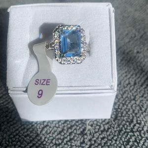 Bomb Party Ring: Lab Created Light Blue Quartz on Rhodium Plating